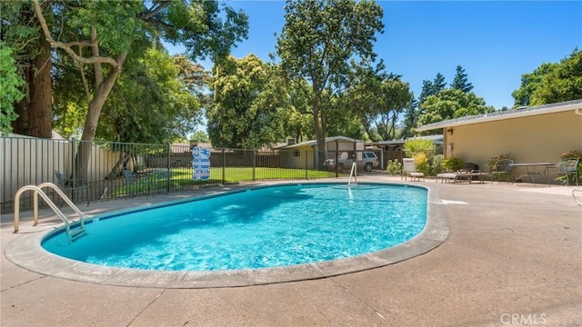 view of pool with a patio area