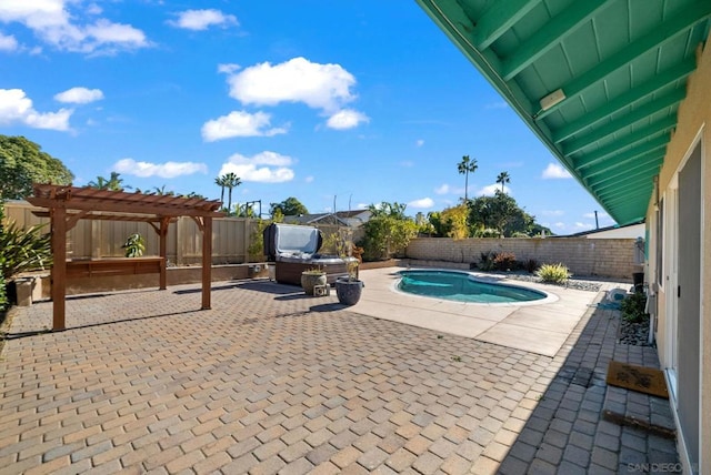 view of swimming pool with a pergola and a patio