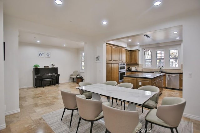 dining space with sink