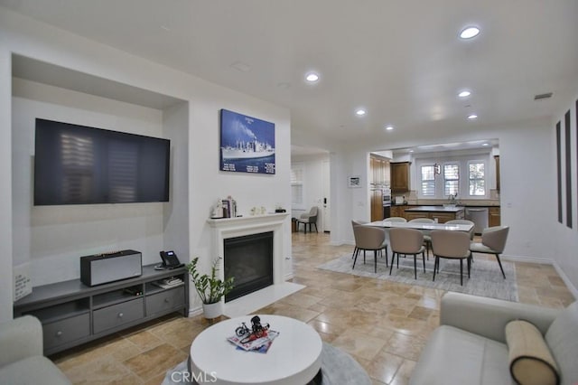 living room featuring sink