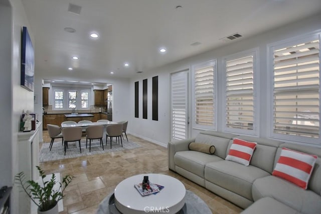 living room featuring sink