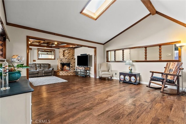 living room with lofted ceiling with skylight, a fireplace, and hardwood / wood-style flooring