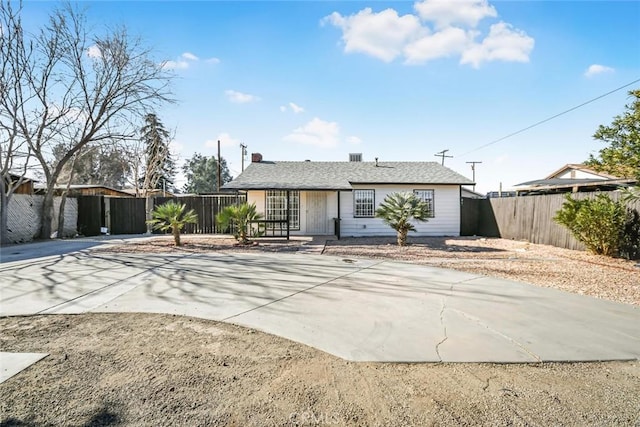 ranch-style house with a patio area