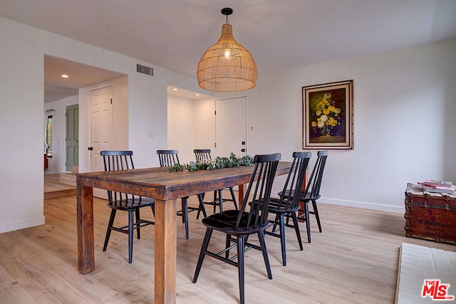 dining room featuring light hardwood / wood-style floors