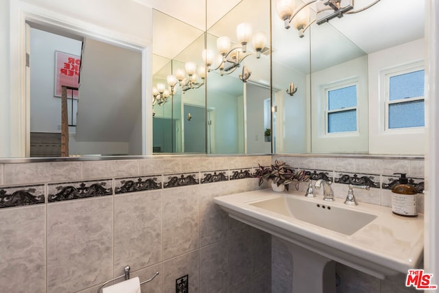 bathroom with tile walls