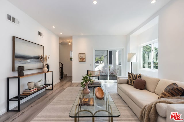 living room featuring light wood-type flooring