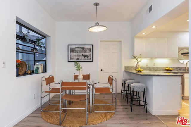 dining area featuring light hardwood / wood-style floors