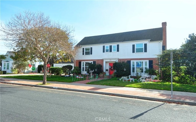 view of front of home with a front yard