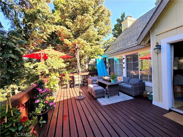 deck featuring an outdoor living space