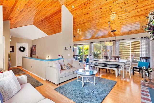 living room with wood ceiling, light hardwood / wood-style flooring, and high vaulted ceiling