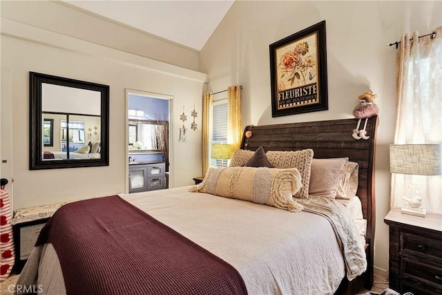 bedroom with vaulted ceiling