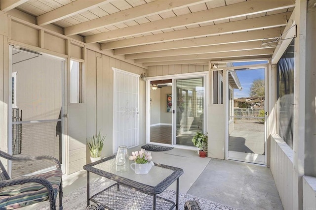 sunroom / solarium with wooden ceiling and beamed ceiling