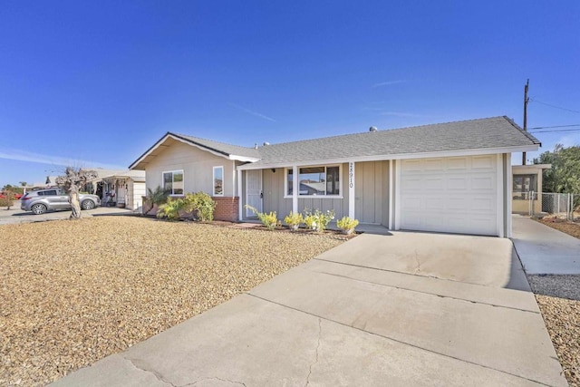 ranch-style house featuring a garage