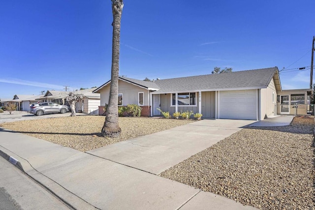 single story home with a garage