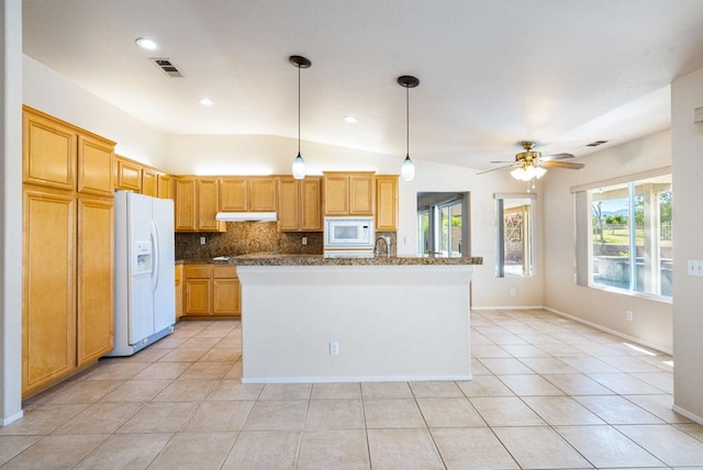 kitchen with pendant lighting, white appliances, backsplash, vaulted ceiling, and light tile patterned floors