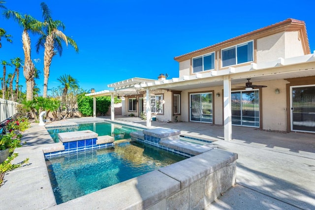 view of pool featuring ceiling fan, a pergola, a patio, and an in ground hot tub