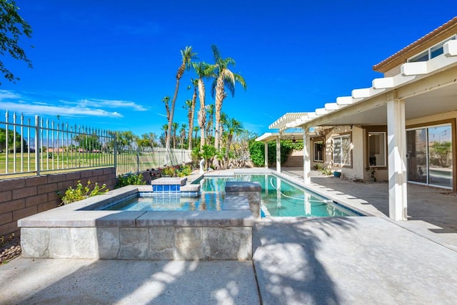 view of pool with a pergola, a patio area, and a hot tub