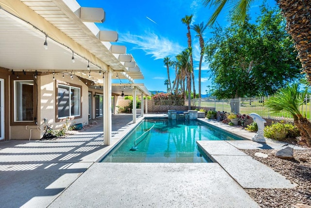 view of swimming pool with ceiling fan, a patio, and a pergola