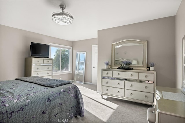 bedroom with light colored carpet