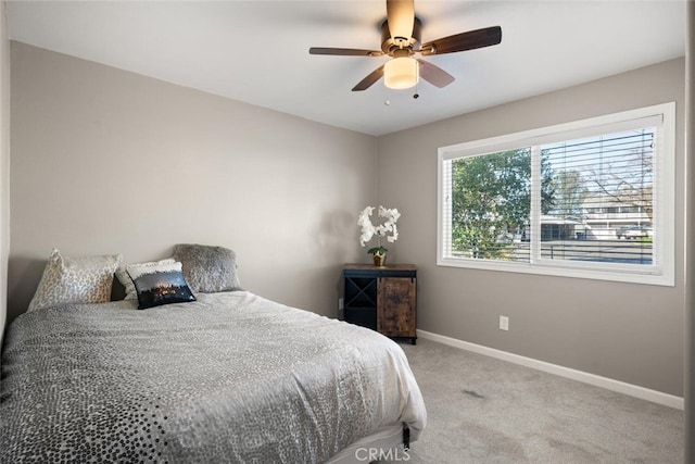 bedroom featuring carpet flooring, ceiling fan, and baseboards