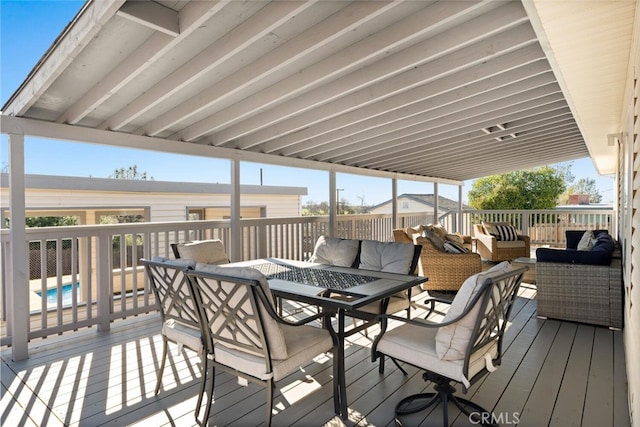 deck with outdoor lounge area