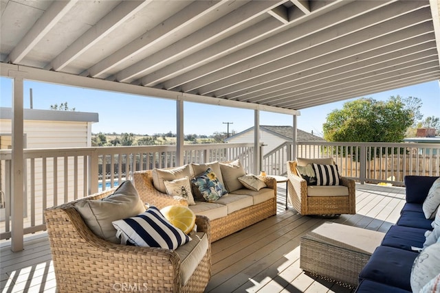 wooden deck featuring an outdoor hangout area