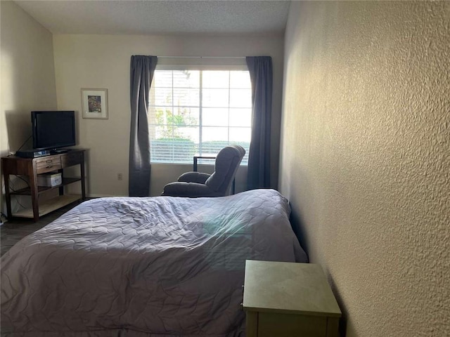 bedroom with a textured ceiling