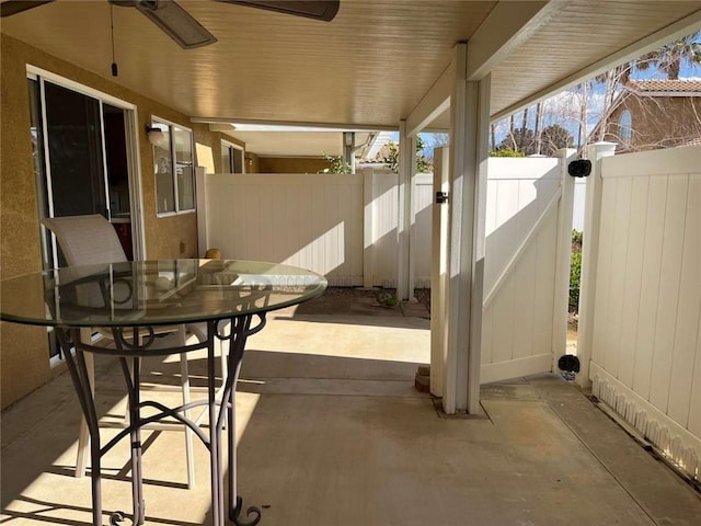 view of patio / terrace featuring ceiling fan