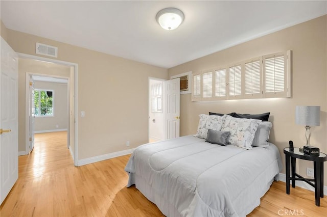 bedroom featuring light hardwood / wood-style floors