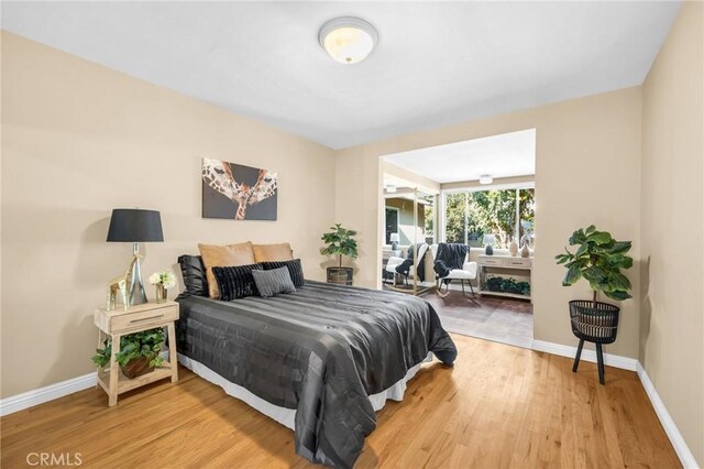 bedroom featuring hardwood / wood-style flooring