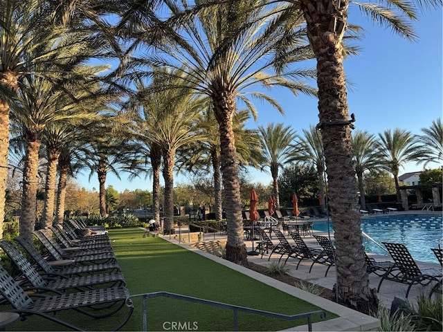 view of home's community featuring a swimming pool