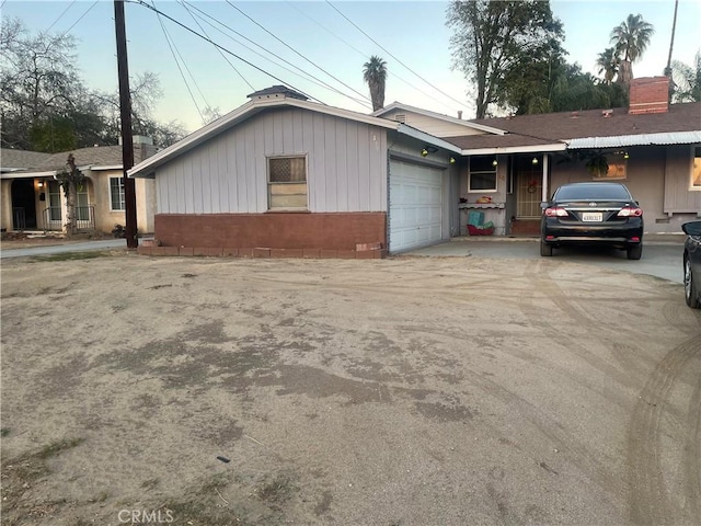 single story home with a garage