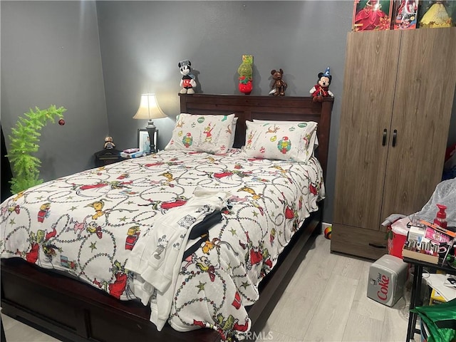 bedroom featuring light wood-type flooring