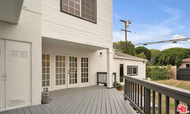 wooden terrace featuring french doors