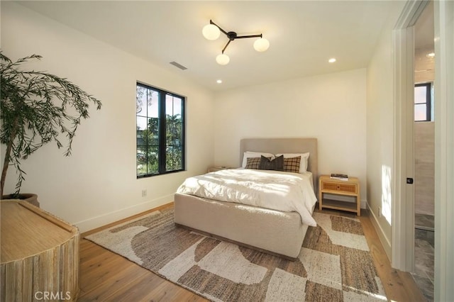 bedroom featuring hardwood / wood-style flooring