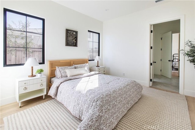 bedroom featuring light hardwood / wood-style floors