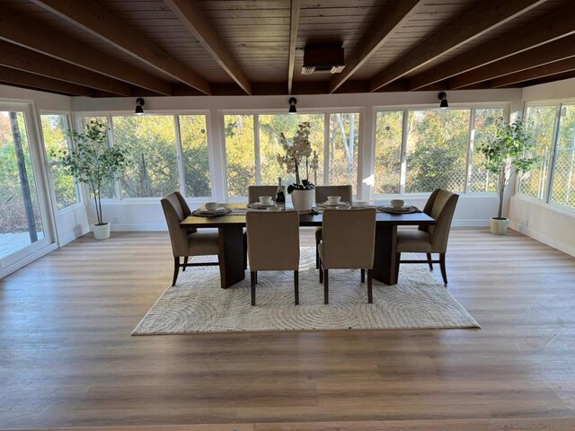 sunroom / solarium featuring plenty of natural light