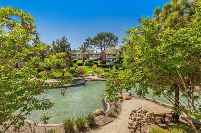 view of property's community with a water view