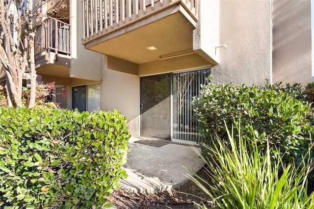 property entrance with a balcony