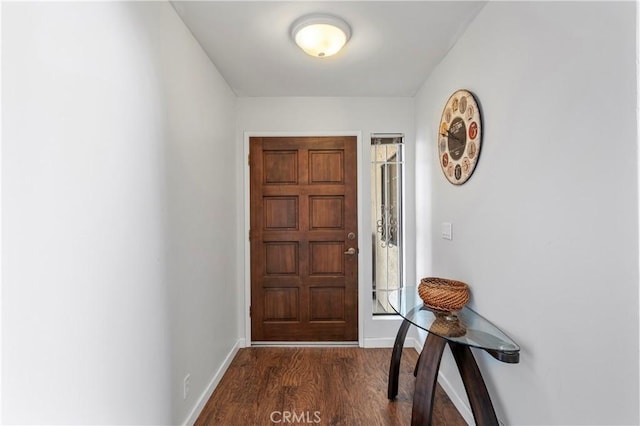 foyer featuring dark wood-type flooring