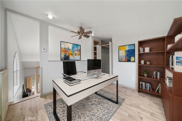 office featuring ceiling fan and light hardwood / wood-style floors