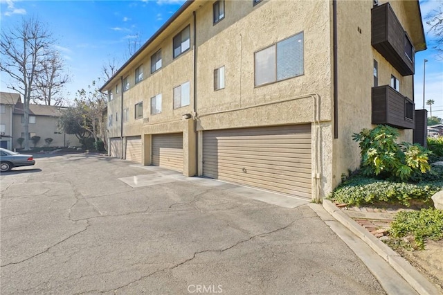 view of building exterior featuring a garage