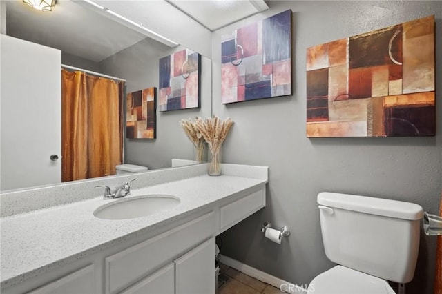 bathroom with tile patterned flooring, vanity, toilet, and a shower with shower curtain