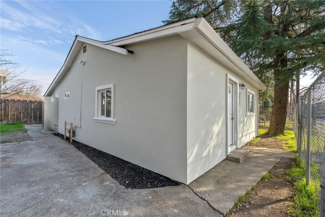 view of home's exterior with a patio area