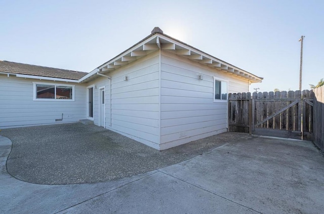 view of home's exterior with a patio area