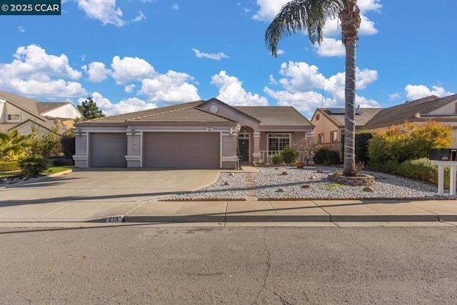 view of front of property with a garage