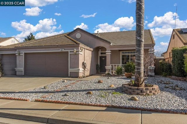 view of front of property featuring a garage