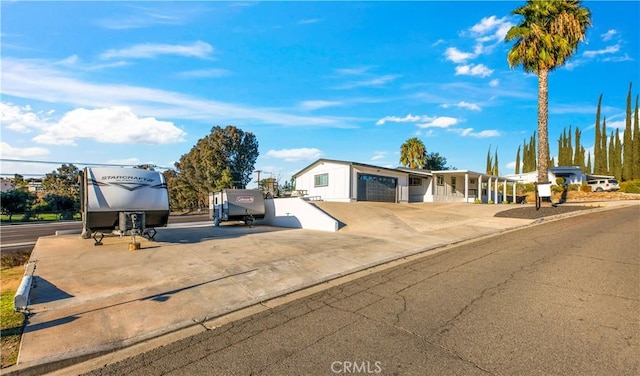 view of front of property featuring a garage