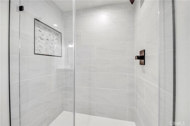 bathroom featuring walk in shower