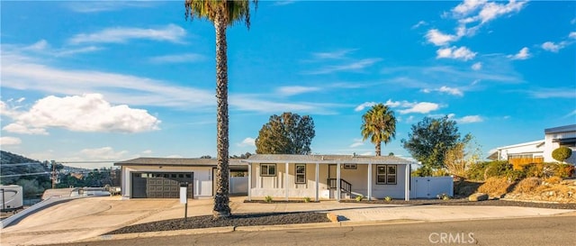 ranch-style home featuring a garage